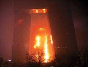 Observers speculate titanium-zinc alloy may have fueled fire on outside of tower.