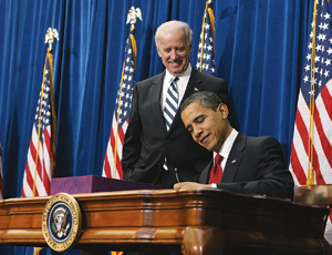 Obama signs the "most sweeping economic recovery package in [U.S.] history."