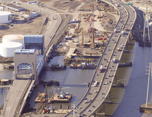 New Q-bridge (top) section foundation is located between existing I-95 and vertical-lift Tomlinson Bridge.