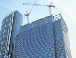 Tower cranes helped the 33-story Blue Cross-Blue Shield building add 24 floors.