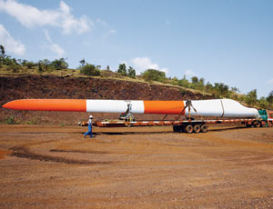 Transporting large turbine blades to construction sites poses challenges.