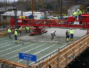 Finishing Concrete Bridge Decks: All-Hydraulic Rig