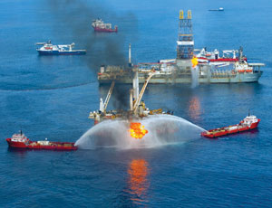 mitigation Above, gas and oil is burned off at the site of the April 20 Deepwater Horizon well disaster in the Gulf of Mexico. BP says it is capturing more than 23,000 barrels of oil a day and burning about half of it.