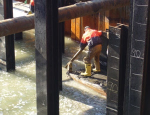 Contractor is repairing errors in concrete pours and girder design.