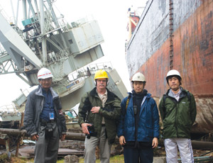From left: ASCE tsunami team leader Gary Chock, ENR’s Tom Sawyer and members of the Japan Society of Civil Engineers, Shusaku Inoue and Hidenori Mogi, documented debris.